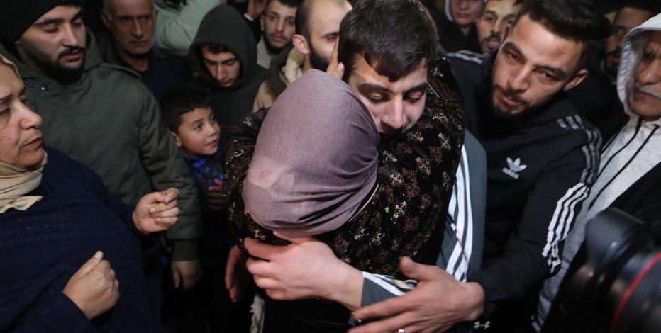Hamas frees 12 more hostages from Gaza as fragile truce with Israel holds