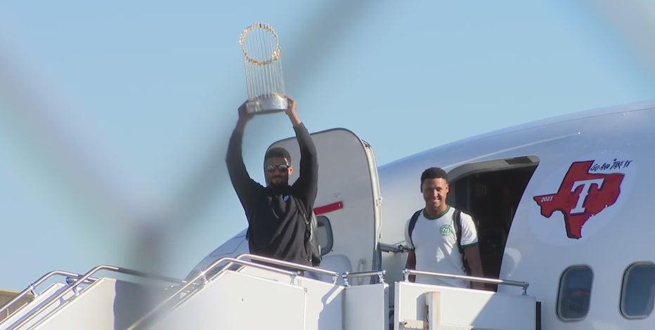 Rangers return to Texas after World Series win
