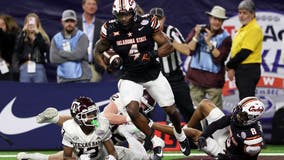 Owens, Presley help No. 22 Oklahoma State beat Texas A&M 31-23 in Texas Bowl