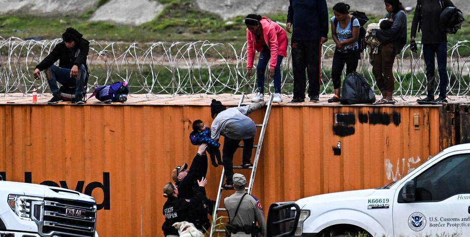 U.S. Department of Justice says it will sue if Texas enforces new law punishing illegal border crossing