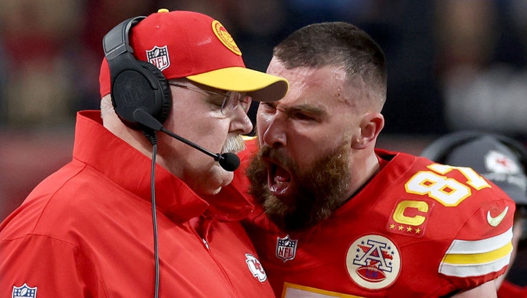 Travis Kelce #87 of the Kansas City Chiefs reacts at Head coach Andy Reid in the first half against the San Francisco 49ers during Super Bowl LVIII at Allegiant Stadium on February 11, 2024 in Las Vegas, Nevada. (Photo by Jamie Squire/Getty Images)