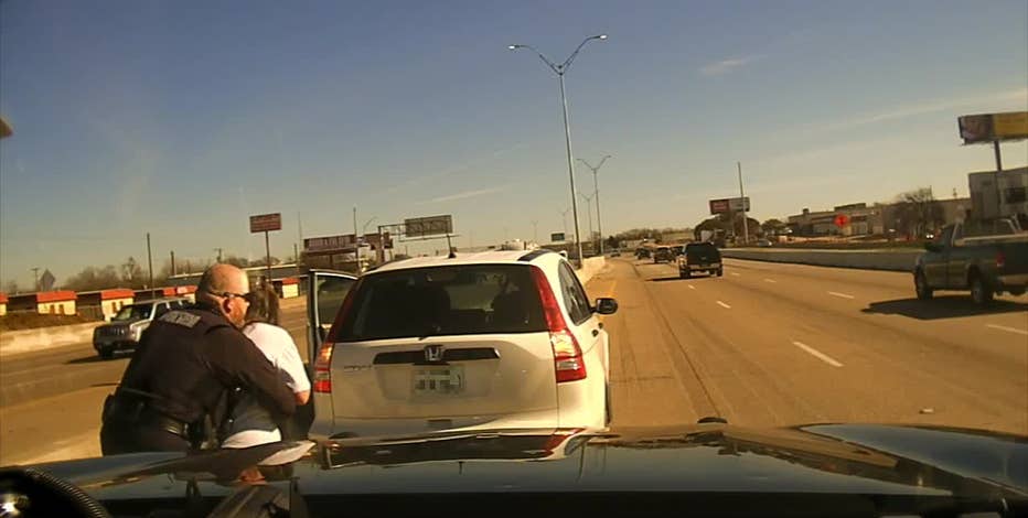 Mansfield officer saves woman who was choking on interstate