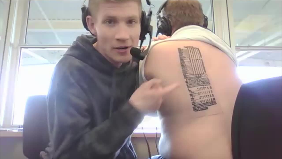 The Ticket host Sean Bass gets tattoo of Rangers World Series winning box score