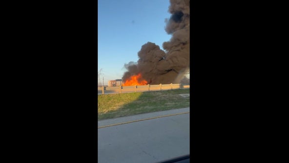 Portion of I-35 in Lewisville closed for a time after crash, fire