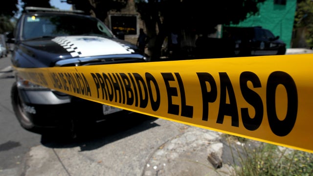 A dozen bodies found in Mexico, 5 piled in an SUV and 7 others near the US border with Arizona