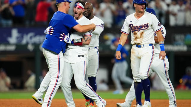 Texas Rangers overcome disputed tip and beat Cubs 4-3 on Opening Day