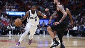 Doncic scores 29, Irving adds 25 and Mavericks roll past Heat 111-92 to claim Southwest Division