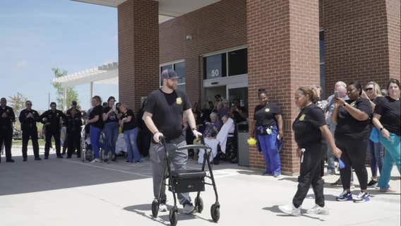 Dallas officer shot during chase released from rehab