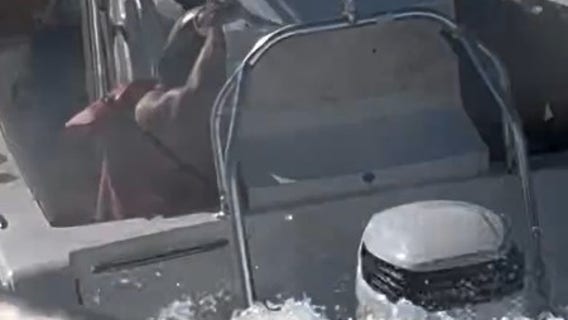 Watch: Four saved from sinking boat in Georgia inlet