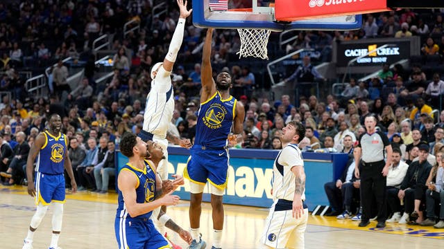 Warriors overcome triple-double by Luka Doncic to beat Mavericks 104-100