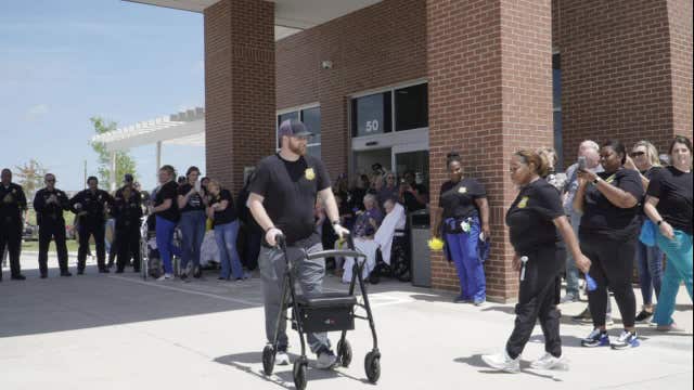 Dallas officer shot during chase released from rehab