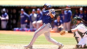 Texas Rangers score 10 runs in second inning, beat Oakland Athletics 15-8