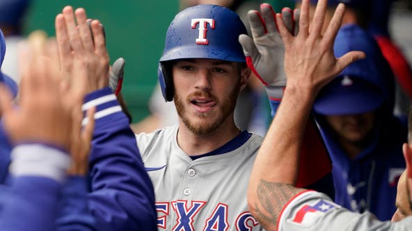 Heim homers in the 9th and Lowe hits an RBI single in the 10th to lead Rangers past Royals 3-2
