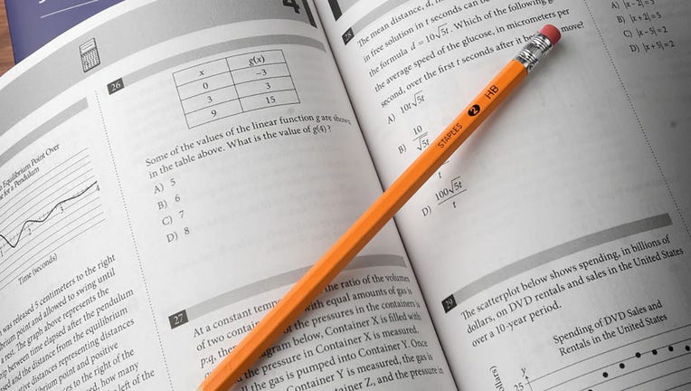FILE - Close-up of a pencil on a page of an SAT college entrance exam preparation book, taken on August, 6, 2017, in Melville, New York. (Photo by Thomas A. Ferrara/Newsday RM via Getty Images)