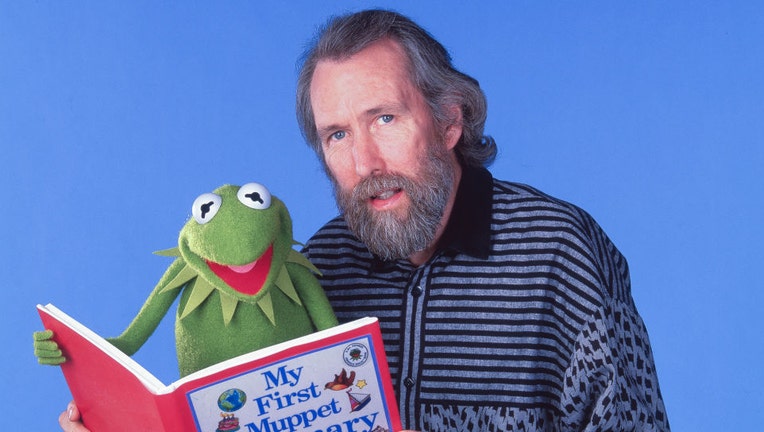 jim henson with kermit reading