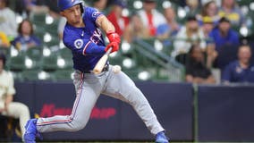 Rhys Hoskins' grand slam sparks Brewers to 6-3 victory over Rangers