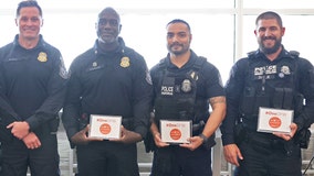 DFW Airport customs officers honored for saving traveler's life