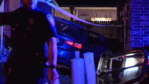 Car crashes into Fort Worth house after deadly shooting