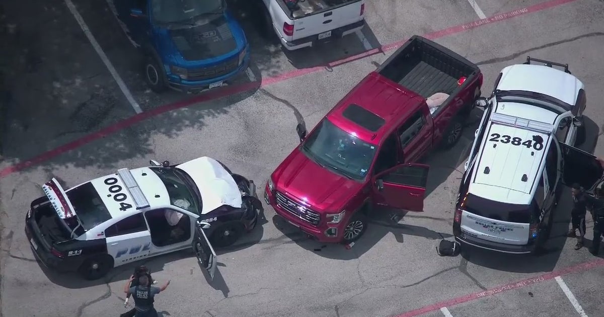Dallas police shoot armed suspect after stolen truck rams cruisers ...
