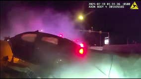 VIDEO: The Colony police pull driver out of burning car