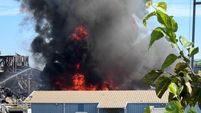 Crews battle fire at West Dallas recycling facility