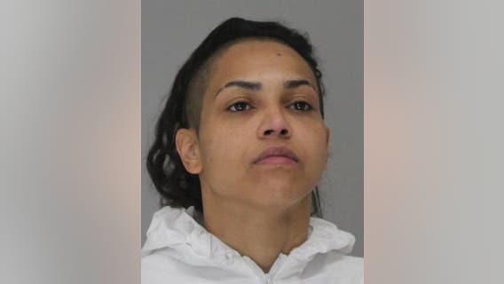 Woman charged with killing Dallas store clerk to steal bottled water