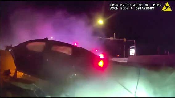 VIDEO: The Colony police pull driver out of burning car