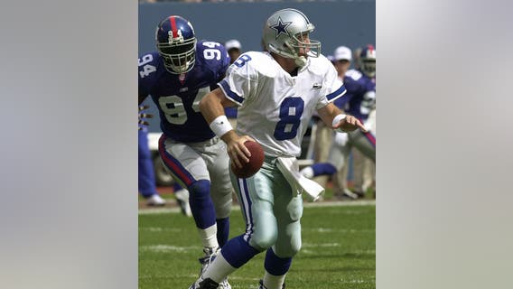 Troy Aikman's 'Eight' trademark challenged by Lamar Jackson