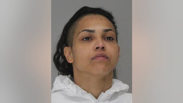 Woman charged with killing Dallas store clerk to steal bottled water