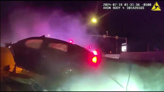 VIDEO: The Colony police pull driver out of burning car