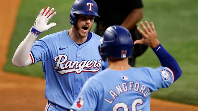 Heim homers, Heaney solid as Rangers beat Orioles 3-2 to avoid sweep