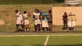 High school football players try to stay safe, cool in excessive heat