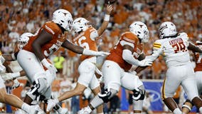 No. 1 Texas keeps rolling behind Manning and Blue and routs ULM 51-3 in last game before SEC play