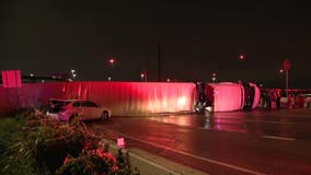 Overturned 18-wheeler loaded with Amazon packages shuts down I-35 after flash floods