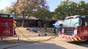 Bedford house fire sends 2 to hospital
