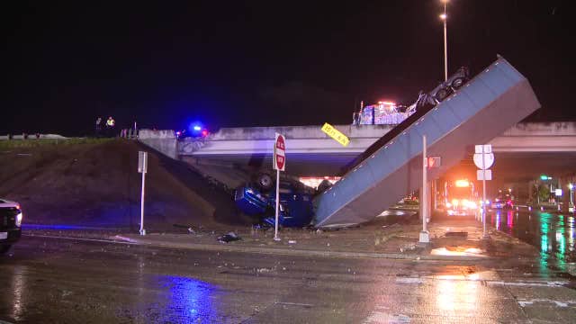 Crash leaves semi-truck dangling over I-35W in Fort Worth amid heavy rain