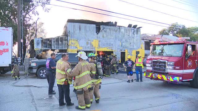 Northwest Dallas tire shop fire sends large plumes of smoke into the air