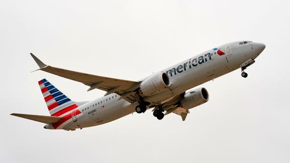 American Airlines passengers restrain man who tried to open plane door on DFW-bound flight