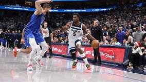 Edwards scores 26, Wolves hold on to beat Mavs 105-99 after Doncic injury