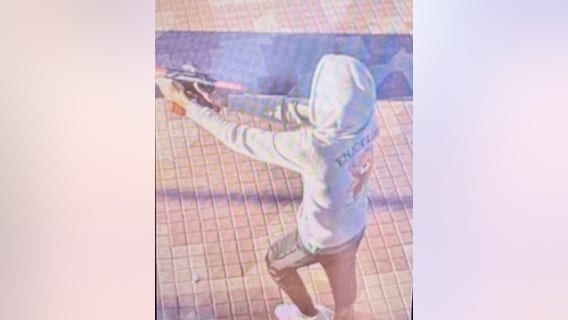 Surveillance photo shows South Dallas DART shooting suspect holding up long gun