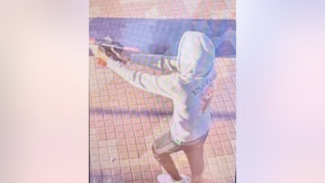 Surveillance photo shows South Dallas DART shooting suspect holding up long gun