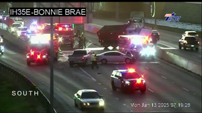 Crash on I-35E near UNT leaves dump truck dangling, hazardous waste cleanup causes major delays