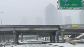 Light snow dusts North Texas while Southeast Texas sees blizzard-like conditions