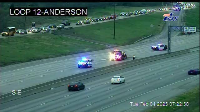 Driver crashes into parked police car in West Oak Cliff