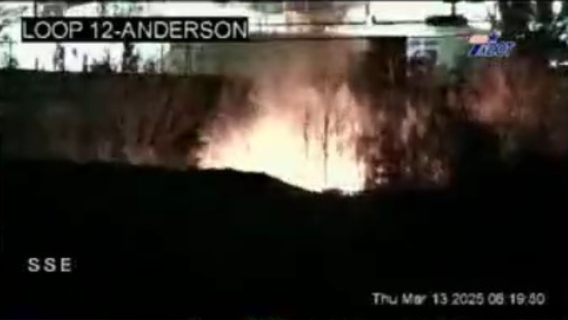 Grass fire burns along I-30 in Dallas