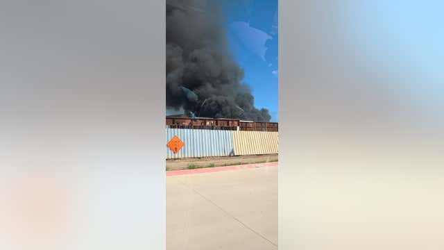 Dallas recycling plant fire sends thick smoke into the air