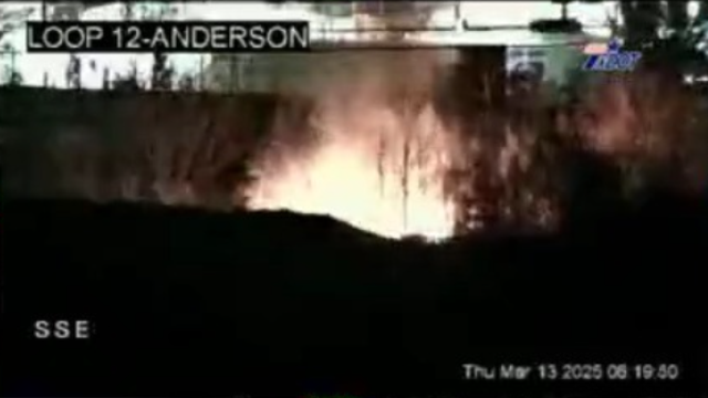 Grass fire burns along I-30 in Dallas