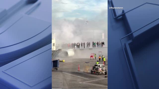 American Airlines flight to DFW catches fire at Denver International Airport