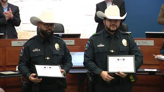 Little Elm police officers honored after saving children from burning home