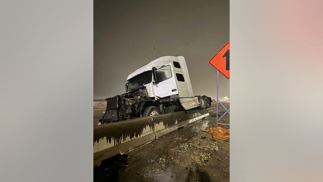 I-35E shut down in Carrollton after 18-wheeler crash, fuel spill